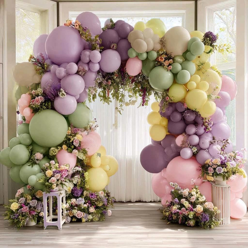 Partycus lavender and dusty green arch balloons create elegant baby shower décor.