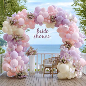 Partycus pastel balloon arch double stuffed lavender pink backdrop for baby showers.