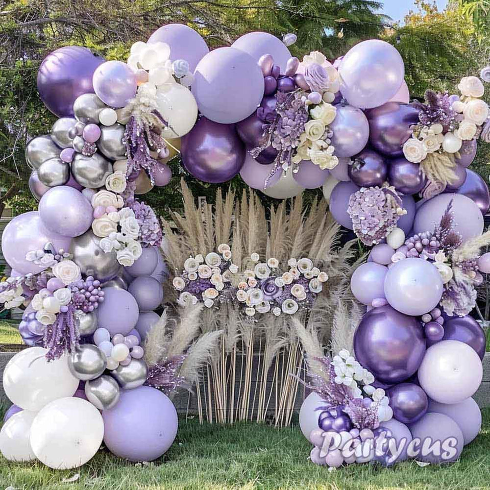 Partycus pastel-purple-white balloon arch double-stuffed setup creates a chic centerpiece for celebrations.