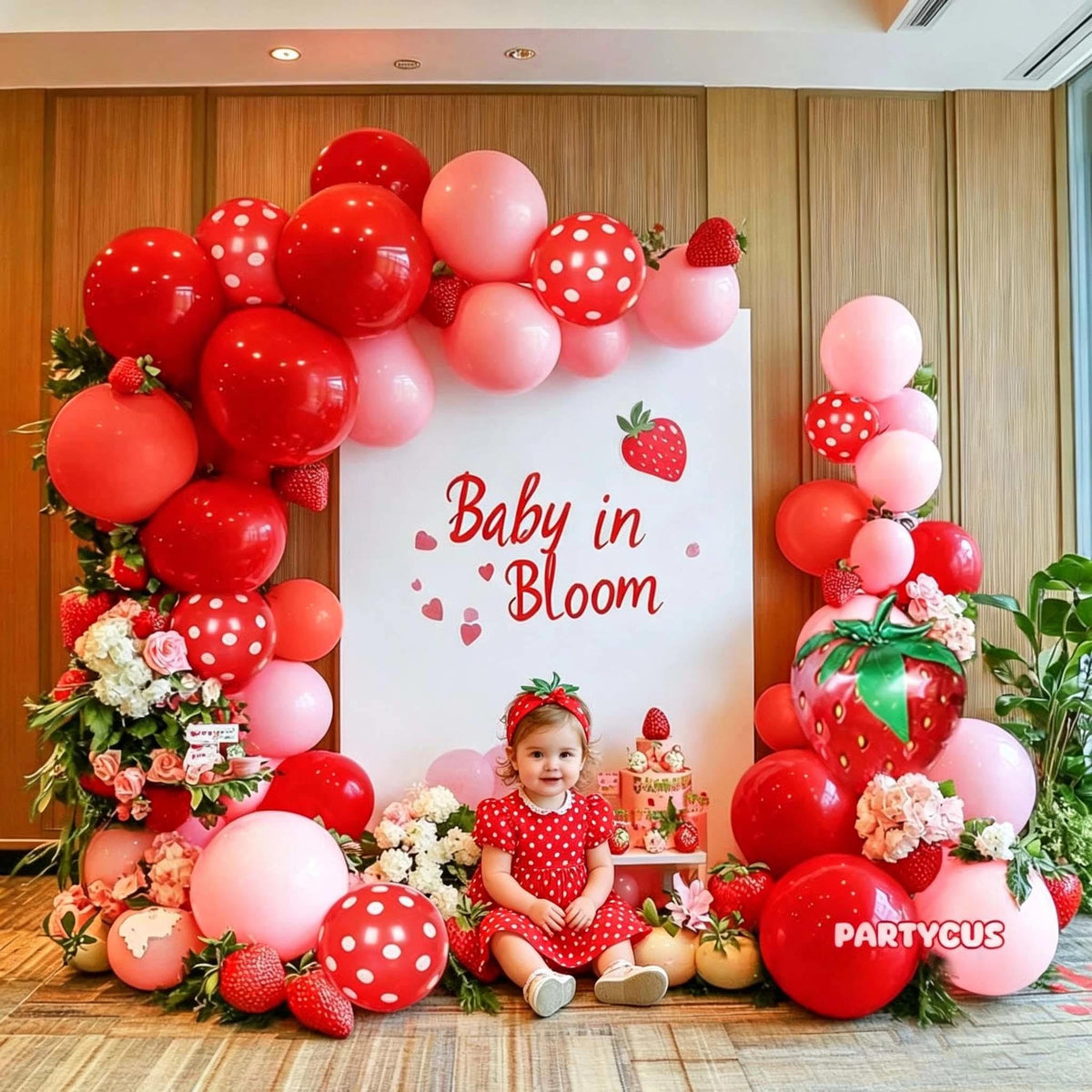 Partycus Strawberry foil 18in balloon creates a bold focal point for photos.