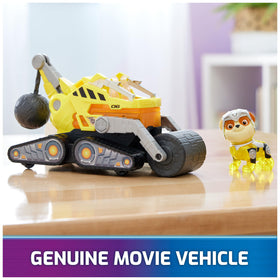 Paw Patrol Mighty Movie rescue vehicle lights up during playtime.