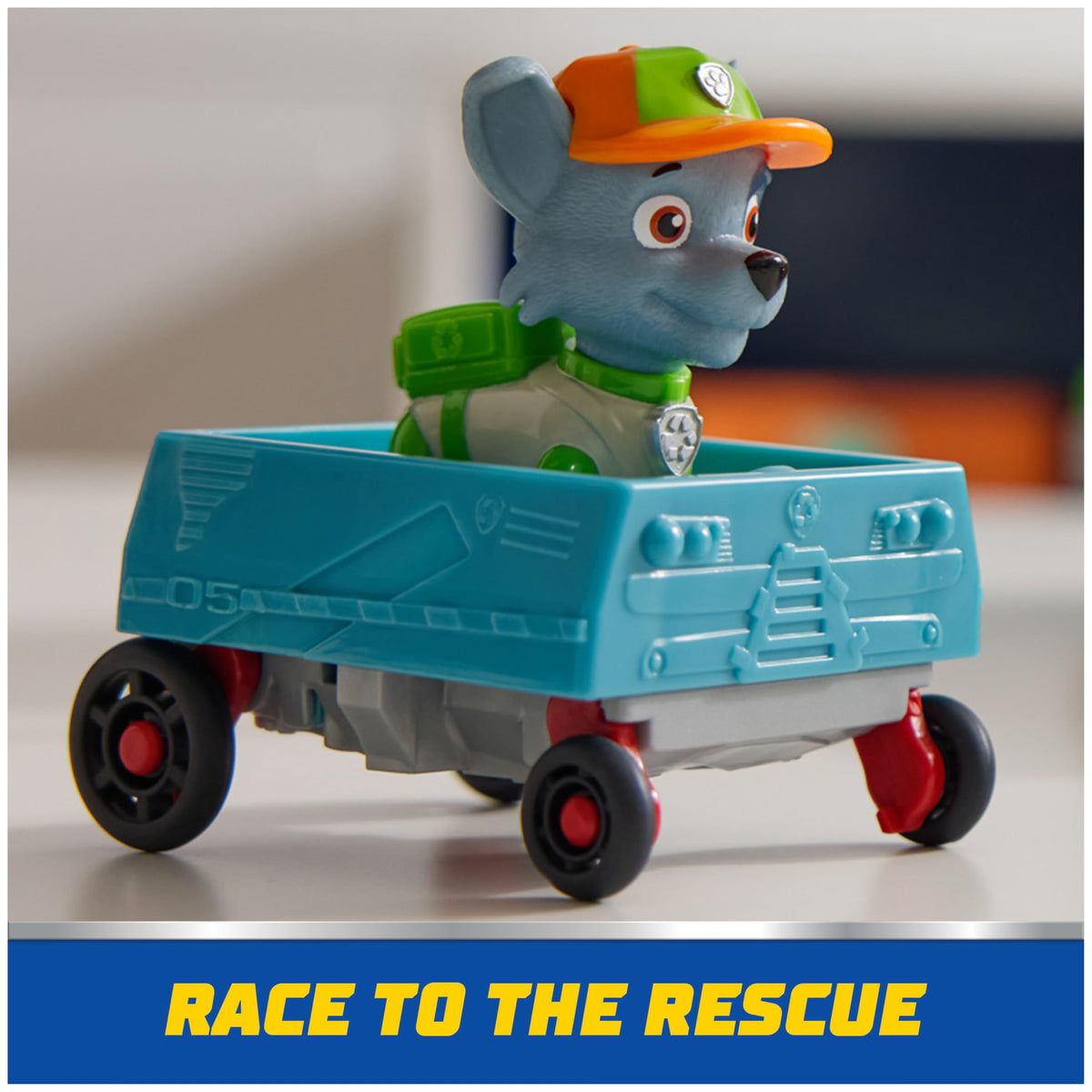 Rocky drives the mini vehicle in PAW Patrol adventures