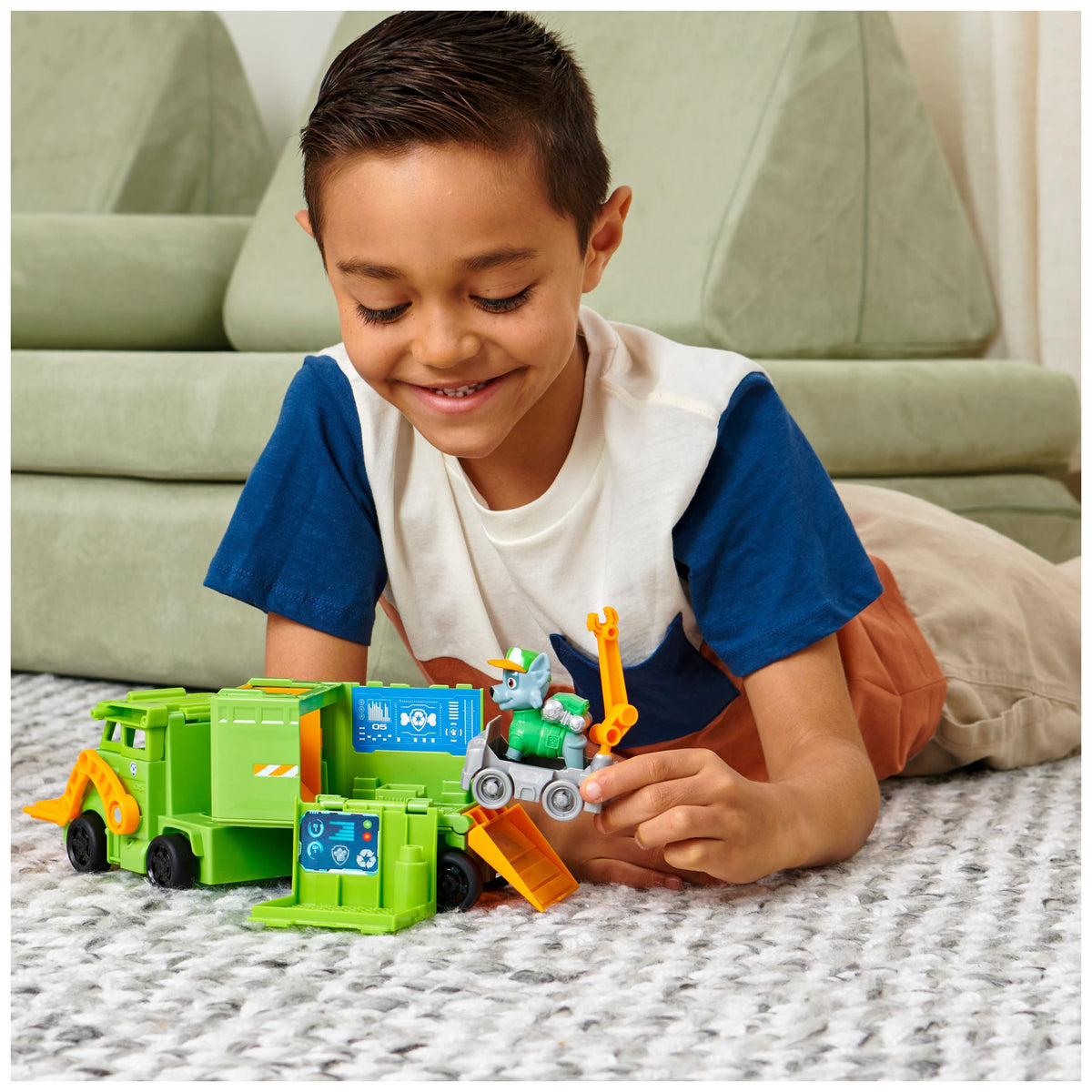 Paw Patrol Rocky transforming truck demonstrates dynamic rescue play.