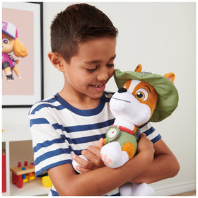 Kids playing with Paw Patrol characters and Tracker during adventures