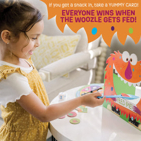 Peaceable Kingdom Feed the Woozle spinner supports quick, collaborative decisions.