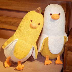 Banana duck plush in a bedroom scene adds soft decor and cuddle friend.