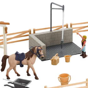 Peagprav imaginative play scene with rider and horses encourages social play.
