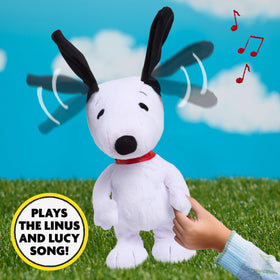 Peanuts Snoopy Happy Dance plush left-hand press starts music for family fun.