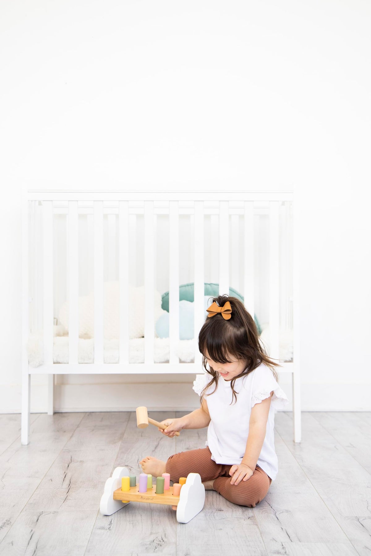 Pearhead hammer bench compact size fits small play spaces.