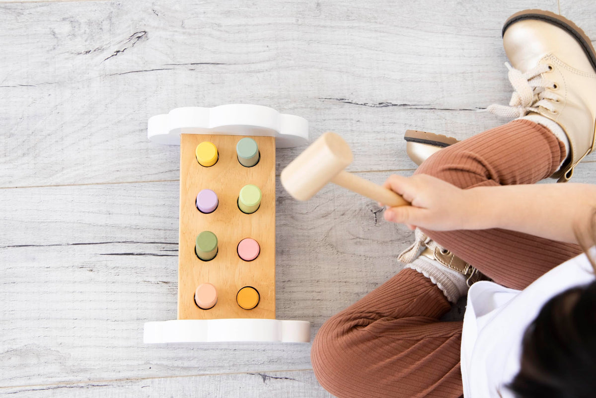 Pearhead hammer bench smooth edges promote safe, worry-free play.