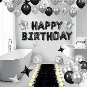 Peconal silver and black star balloons add polished party flair