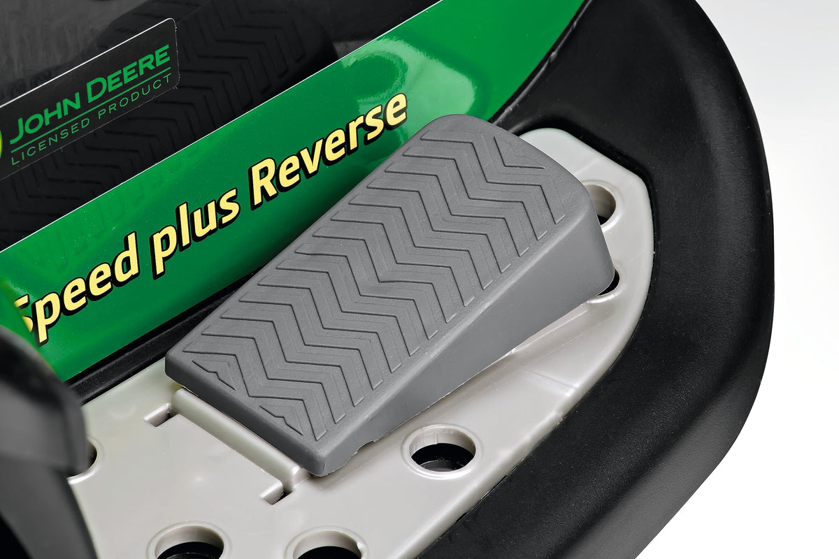 Peg Perego John Deere tractor with detachable trailer expands pretend cargo play.