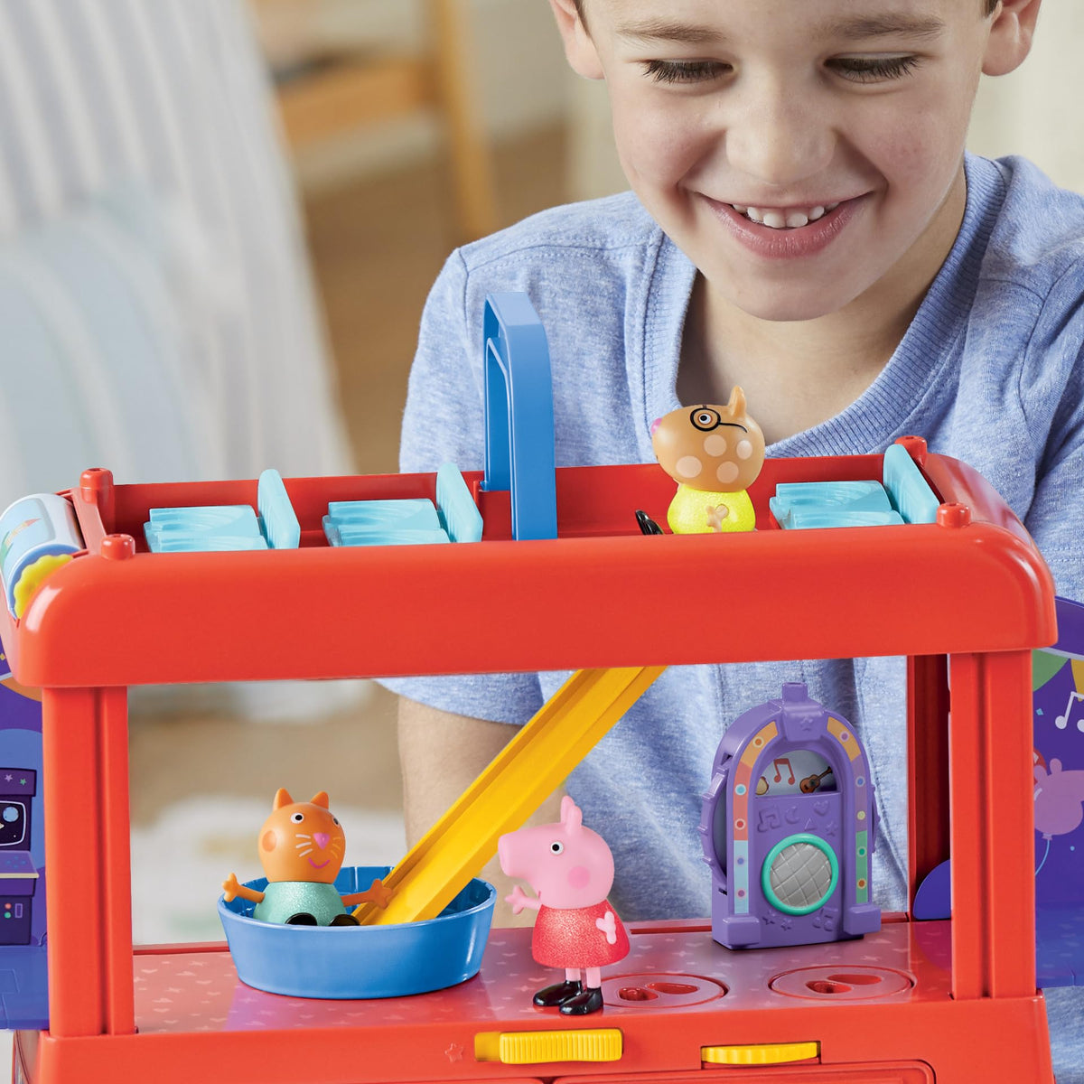 Roundabout spinning feature on Peppa Pig set encourages kinetic action play.