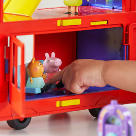 Slide and seesaw elements on Peppa Pig party bus create dynamic pretend adventures.
