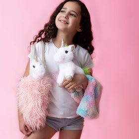 Elegant XL pink furry purse for carrying toys and accessories.