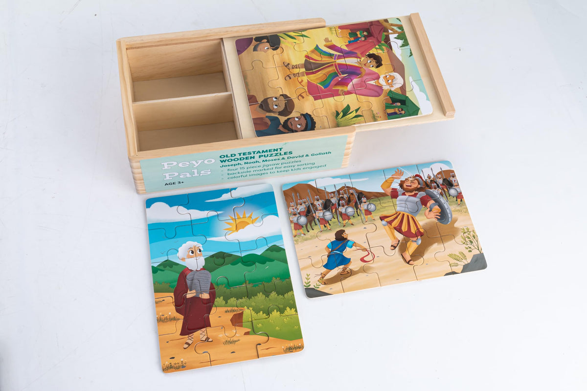 Peyo Pals wooden puzzle pieces inside box.