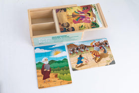 Peyo Pals wooden puzzle pieces inside box.