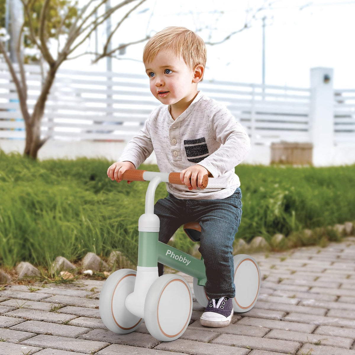 Phobby four-wheel design supports indoor and outdoor first rides.