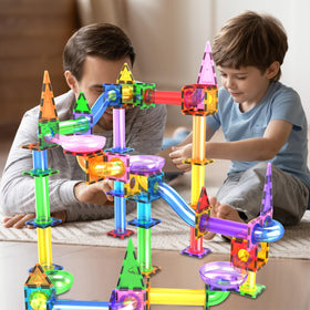 PicassoTiles track pieces and slides forming multi-level pathways for spatial thinking.
