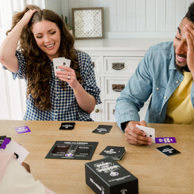 Close-up of Pick Your Poison scenario cards offering 300 prompts for endless laughs.