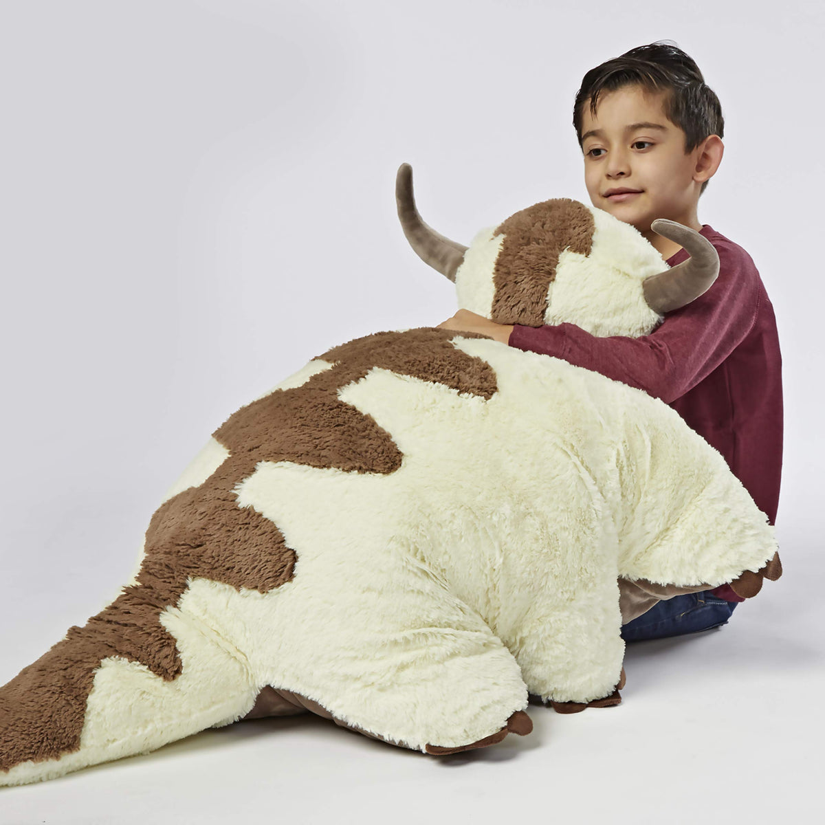 Pillow Pets Appa Jumboz bedtime-snuggle shot demonstrates cozy-night comfort after a long day.