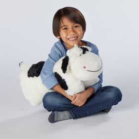 Pillow Pets Cozy Cow plush smiling face ready for cuddle time.