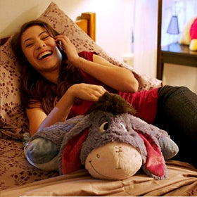 Pillow Pets Disney Eeyore plush, versatile toy and travel pillow for comfort.