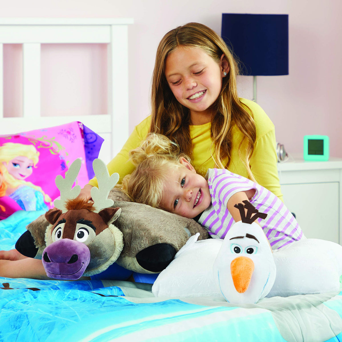 Pillow Pets Disney Olaf snowman plush traveling companion on a car seat.