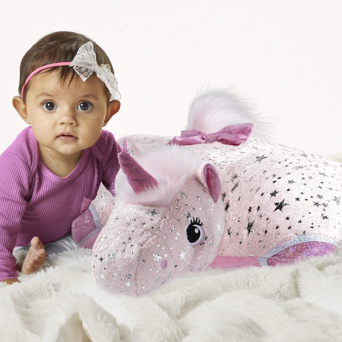 Pillow Pets Originals Sparkly Pink Unicorn bow and tail detail adds charm for bedtime.