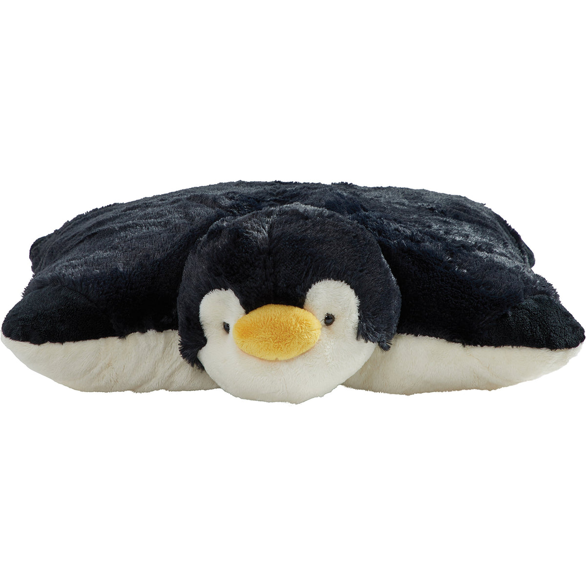 Pillow Pets Playful Penguin on bed, ideal for bedtime reading.