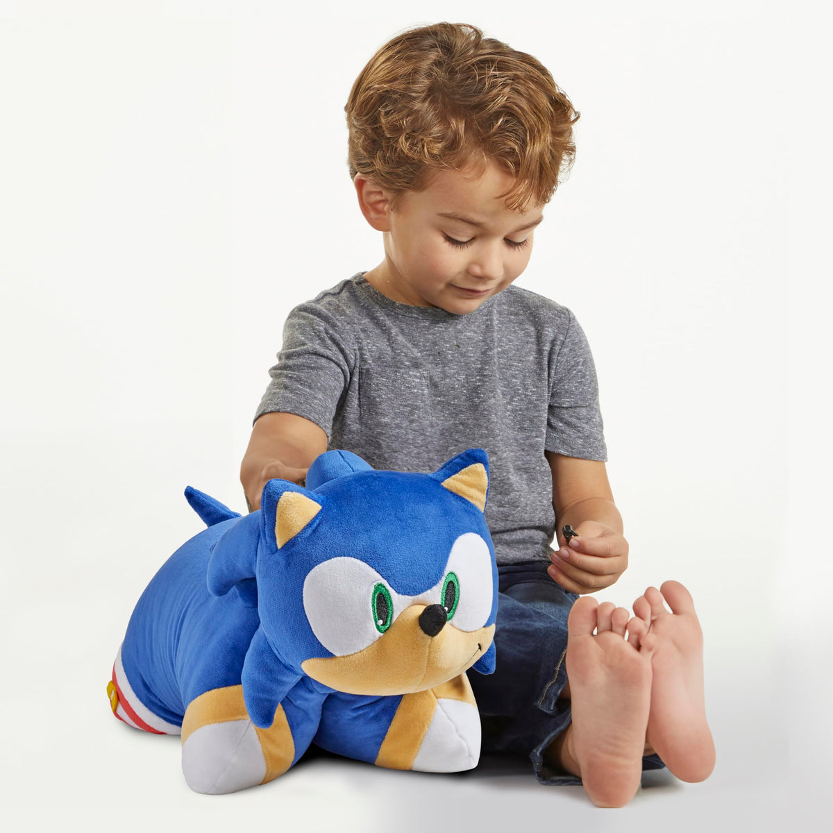 Pillow Pets Sonic Hedgehog plush used during reading for cozy focus