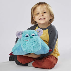 Sulley purple spots on plush, inviting kids to imagine Monstropolis adventures during quiet evenings.