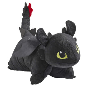 Pillow Pets Toothless eyes glow for a friendly bedtime companion.