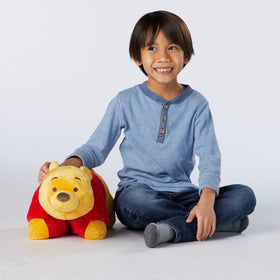 Pillow Pets Winnie the Pooh as a travel companion for road trips.