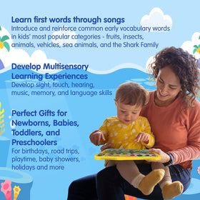 Pinkfong Baby Shark Sing & Learn Pad volume dial closeup indicates safe adjustable listening.