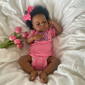 Pinky Reborn doll in outfit ready for dress-up and display