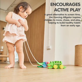 PlanToys Dancing Alligator pull toy is baby-friendly and durable for early exploration.