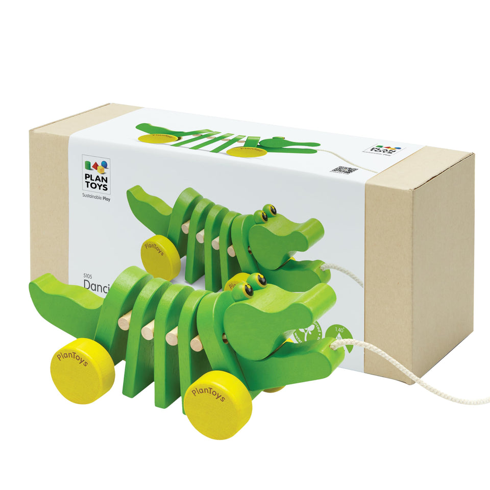 PlanToys Dancing Alligator pull toy shows head and tail movement during walking.
