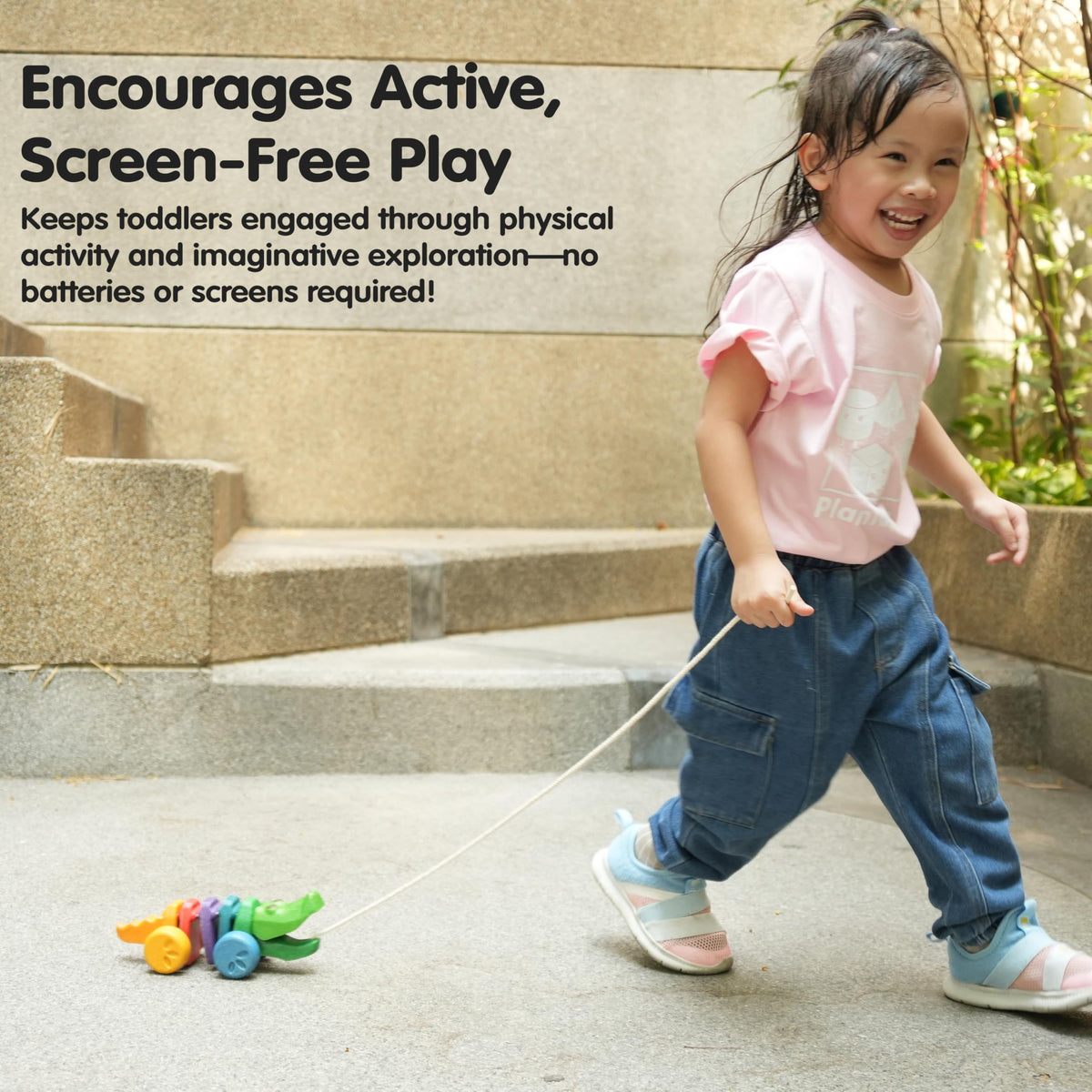 PlanToys Rainbow Dancing Alligator supports motor skills through walking play