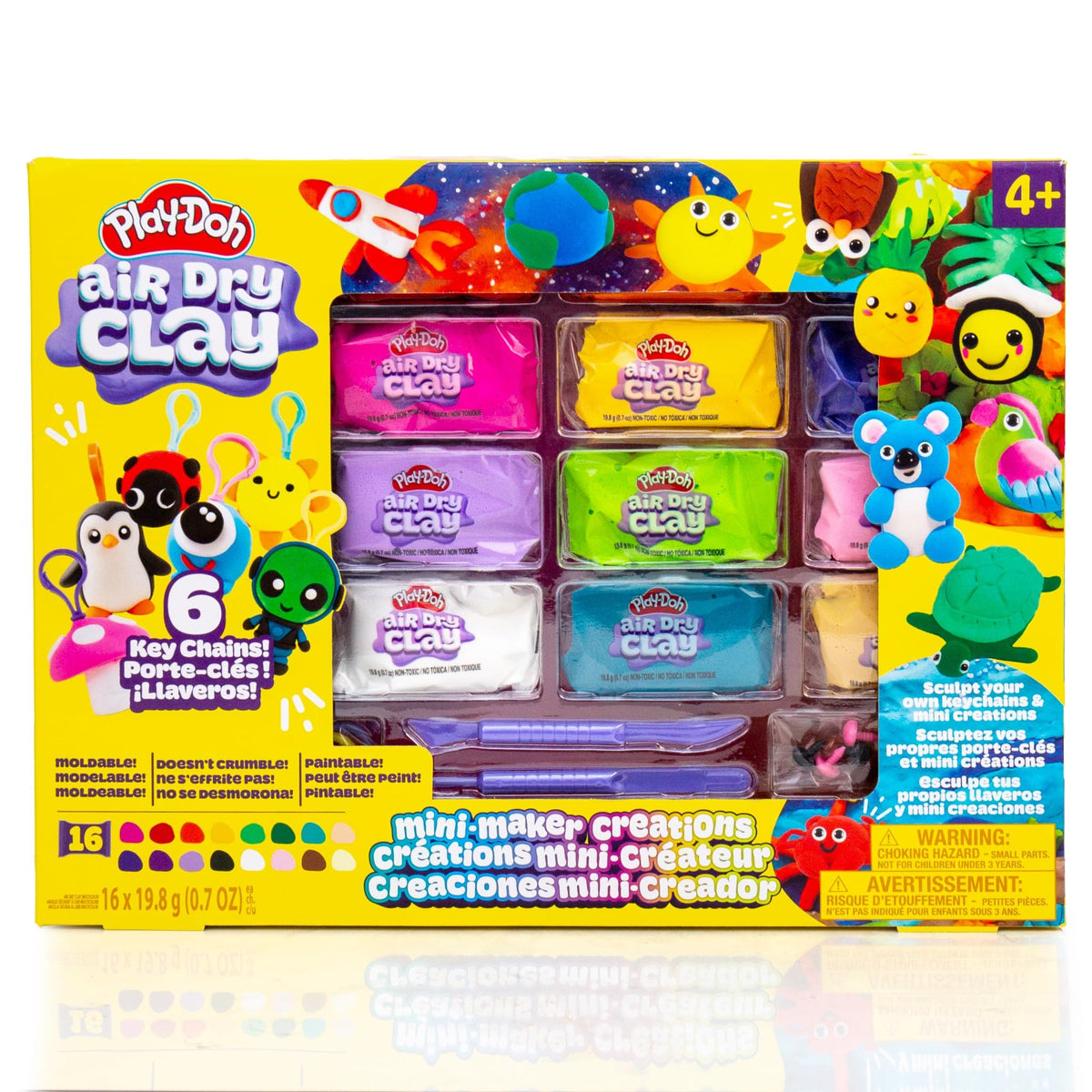 Play-Doh finished keychains drying on a flat surface.