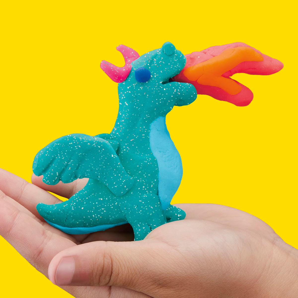 Play-Doh bulk 4-pack sensory texture enhances hands-on play.