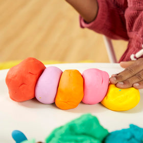 Play-Doh bulk 4-pack purple can adds bold color for storytelling and tactile play.