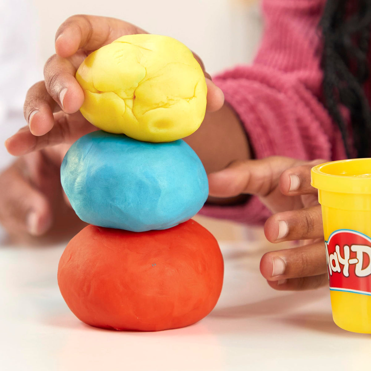 Play-Doh classroom use with multiple colors for collaborative activities.