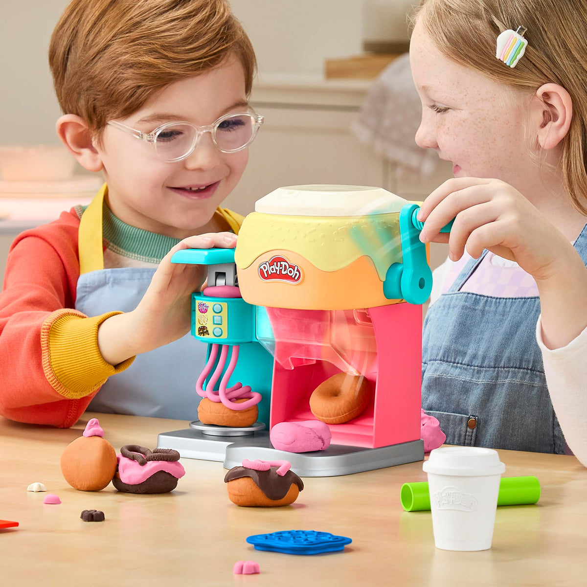 Play-Doh Donut Drop Shop safety guard ensures proper assembly for smooth play.