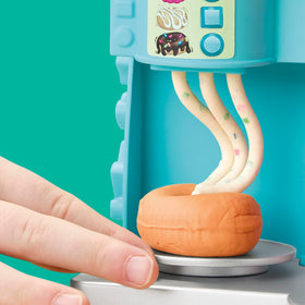 Play-Doh Donut Drop Shop sprinkles molds for bright embellishments and pretend treats.