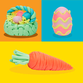 Play-Doh eggs beside Easter basket ready for gifting.