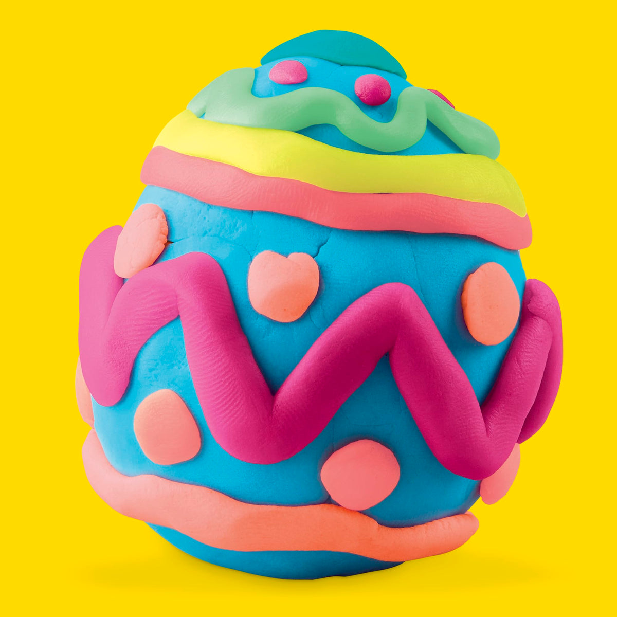 Play-Doh eggs open to reveal squishy modeling compound for hands-on creativity.