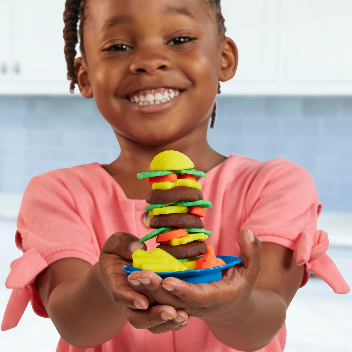 Window pass-through lets kids share creations with friends.