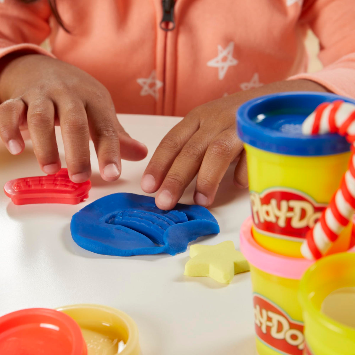 Play-Doh packaging is simple and recyclable for easy setup.