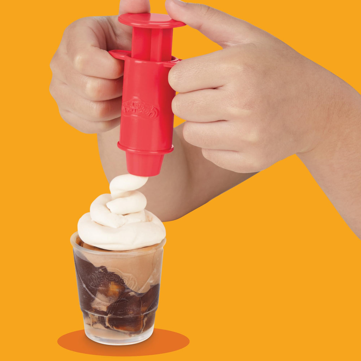 Play-Doh Sizzlin' Grill inkpad option controlled by adults for grill marks